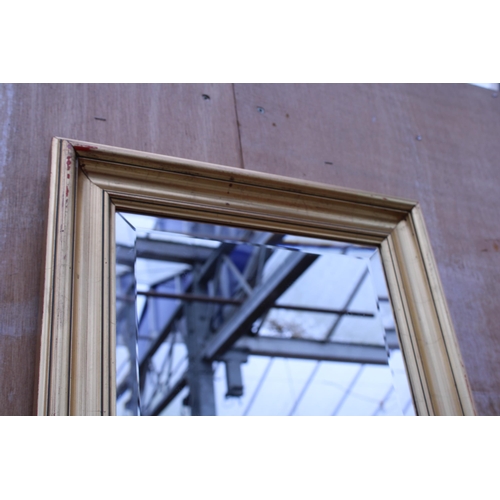 3006 - A GILT FRAMED BEVEL EDGE WALL MIRROR, 39