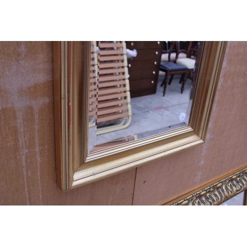 3006 - A GILT FRAMED BEVEL EDGE WALL MIRROR, 39