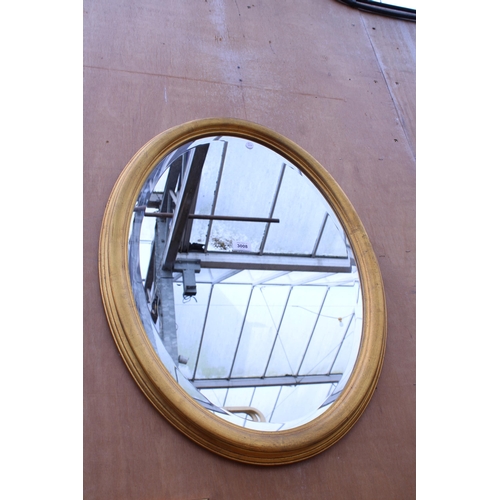 3008 - AN OVAL GILT BOMBAY COMPANY WALL MIRROR WITH BEVEL EDGE, 31