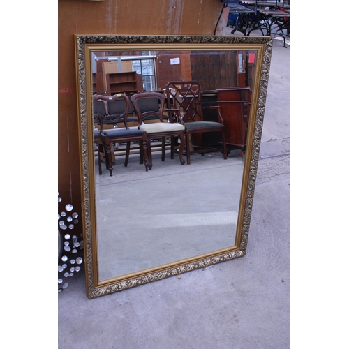 3011 - A GILT EFFECT WALL MIRROR, 44