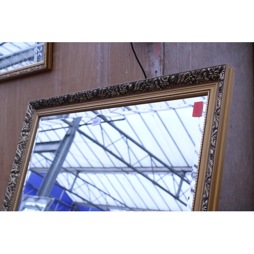 3011 - A GILT EFFECT WALL MIRROR, 44