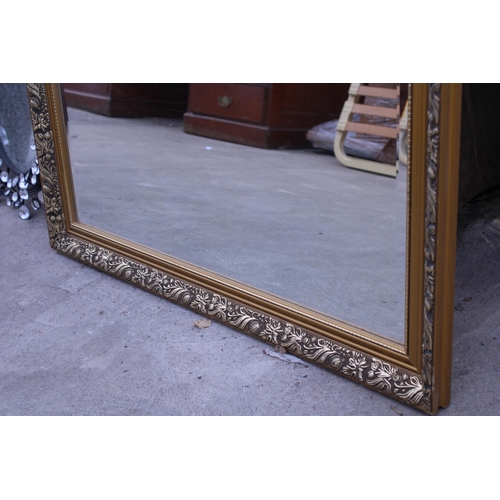 3011 - A GILT EFFECT WALL MIRROR, 44