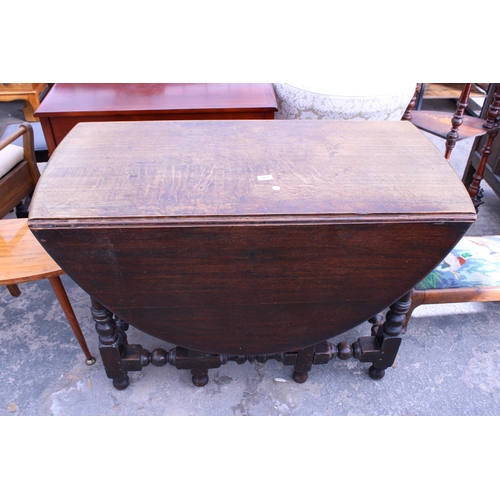 2865 - AN OAK GEORGE III STYLE OVAL GATE-LEG DINING TABLE ON TURNED LEGS, 59.5