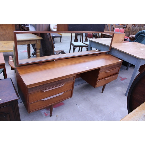 2886 - A RETRO TEAK DRESSING TABLE ENCLOSING SIX DRAWERS, 66