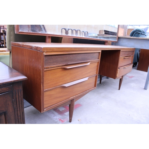 2886 - A RETRO TEAK DRESSING TABLE ENCLOSING SIX DRAWERS, 66