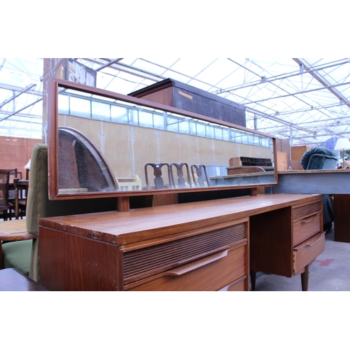 2886 - A RETRO TEAK DRESSING TABLE ENCLOSING SIX DRAWERS, 66