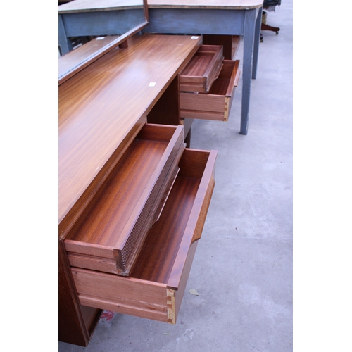 2886 - A RETRO TEAK DRESSING TABLE ENCLOSING SIX DRAWERS, 66