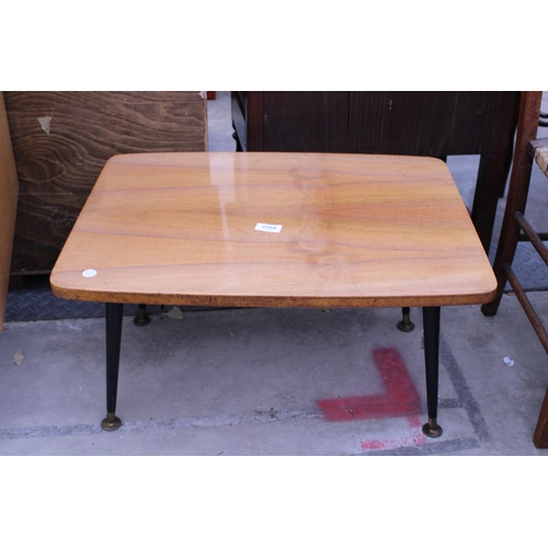 2889 - A MID 20TH CENTURY WALNUT COFFEE TABLE ON BLACK TAPERING LEGS, 24