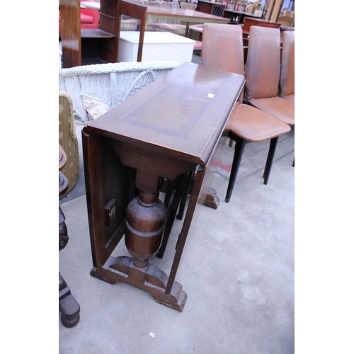 2892 - A MID 20TH CENTURY OAK DROP-LEAF TABLE