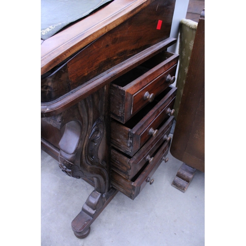 2893 - A VICTORIAN STYLE DAVENPORT WITH EIGHT DRAWERS AND SCROLL FRONT SUPPORTS