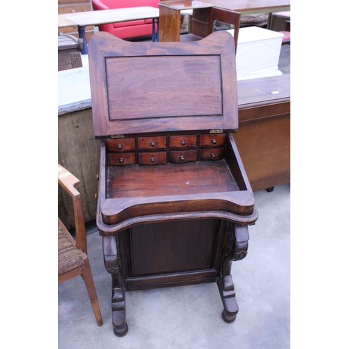 2893 - A VICTORIAN STYLE DAVENPORT WITH EIGHT DRAWERS AND SCROLL FRONT SUPPORTS