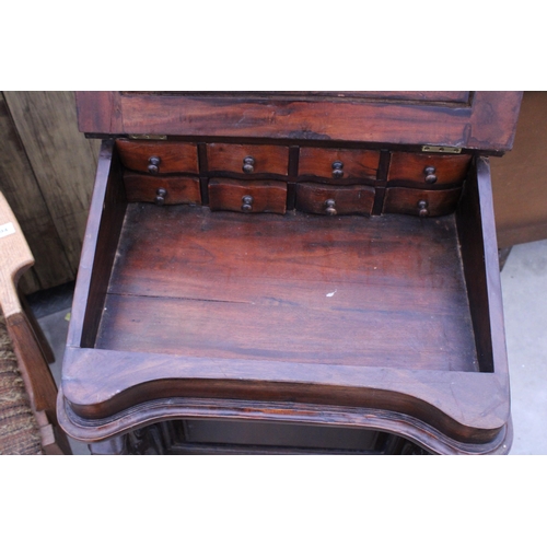 2893 - A VICTORIAN STYLE DAVENPORT WITH EIGHT DRAWERS AND SCROLL FRONT SUPPORTS