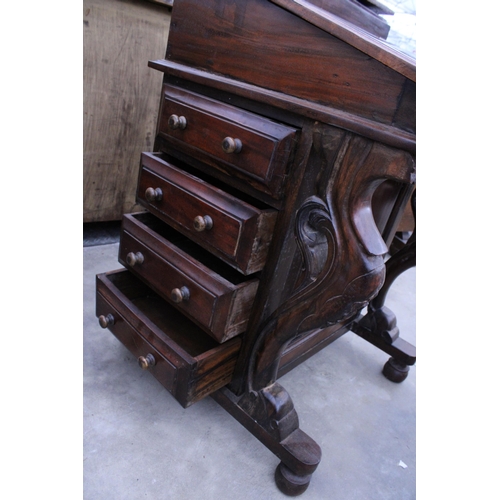 2893 - A VICTORIAN STYLE DAVENPORT WITH EIGHT DRAWERS AND SCROLL FRONT SUPPORTS