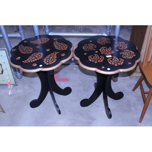 2900 - A PAIR OF BLACK PAINTED OCCASIONAL TABLES WITH GOLD PAINTED TRIM AND PATTERNED TOP, 21