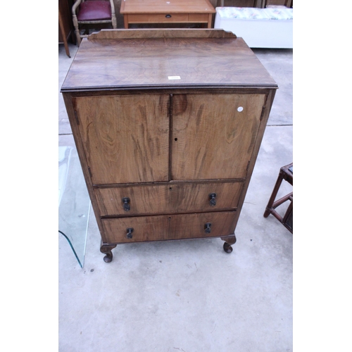 2910 - A MID 20TH CENTURY WALNUT TALLBOY ON CABRIOLE LEGS, 27