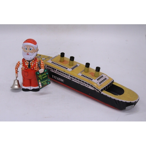 239 - TWO TIN PLATE TOYS TO INCLUDE A CLOCKWORK SANTA AND THE TITANIC