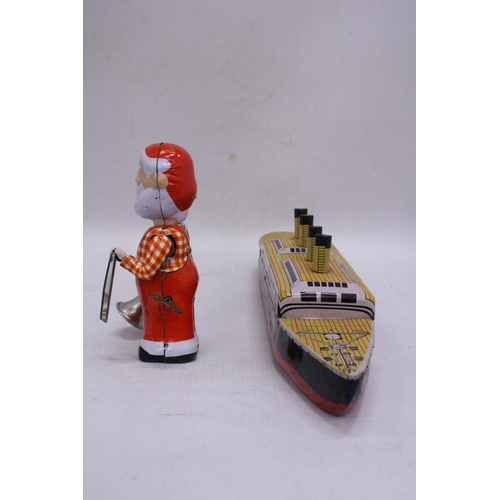 239 - TWO TIN PLATE TOYS TO INCLUDE A CLOCKWORK SANTA AND THE TITANIC