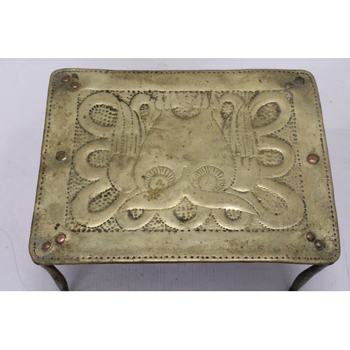 254 - AN ARTS AND CRAFTS BRASS TRIVET WITH OWL DECORATION