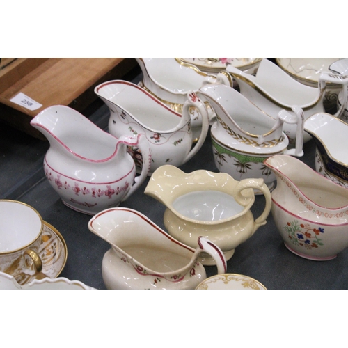 257 - A QUANTITY OF VINTAGE CERAMICS TO INCLUDE MAINLY JUGS, PLUS A TEAPOT, SUGAR BOWL, CUPS, ETC - SOME A... 