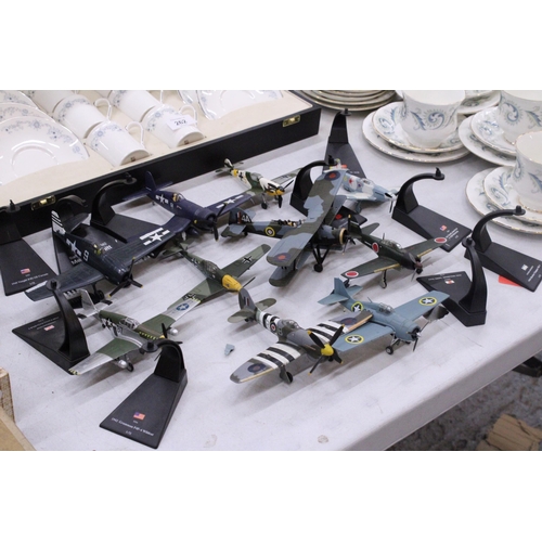 263 - TEN MODEL MILITARY AEROPLANES FROM VARIOUS COUNTRIES ON DISPLAY STANDS