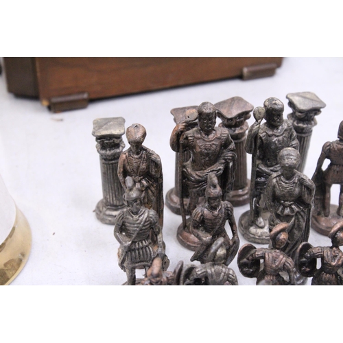 281 - A FULL SET OF THIRTY TWO METAL, ROMAN THEMED CHESS PIECES