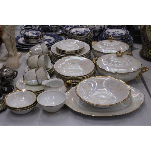 293 - A LUSTREWARE DINNER SERVICE (APPROX 44 PIECES) TO INCLUDE SERVING TUREENS, A SERVING BOWL AND PLATE,... 