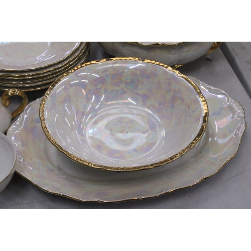 293 - A LUSTREWARE DINNER SERVICE (APPROX 44 PIECES) TO INCLUDE SERVING TUREENS, A SERVING BOWL AND PLATE,... 