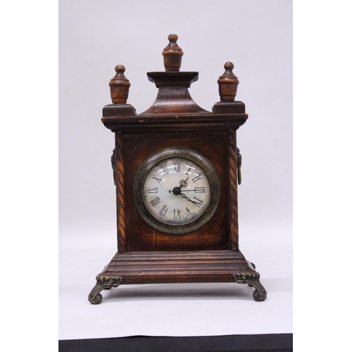 296 - A VINTAGE MAHOGANY CASED MANTLE CLOCK CONVERTED TO BATTERY