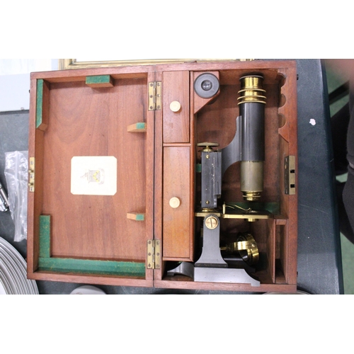 74 - AN EARLY 20TH CENTURY, STUDENT'S BRASS AND BLACK FINISH METAL MONOCULAR MICROSCOPE