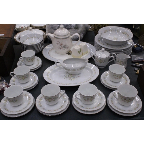 77 - A CHANTILLY PART DINNER SERVICE TO INCLUDE PLATES, BOWLS, A TEAPOT, SERVING PLATES, SUGAR BOWL, CREA... 