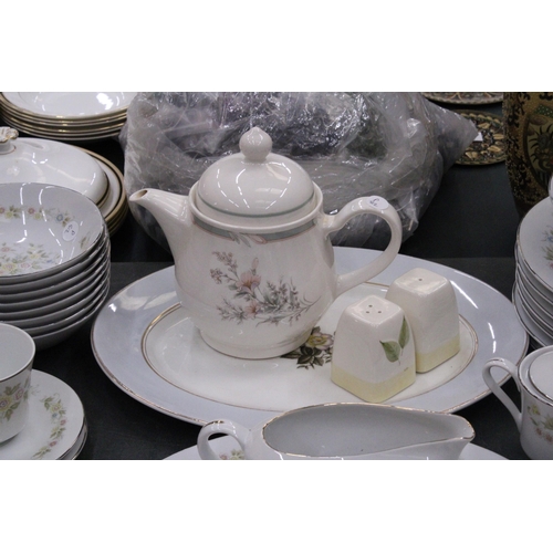 77 - A CHANTILLY PART DINNER SERVICE TO INCLUDE PLATES, BOWLS, A TEAPOT, SERVING PLATES, SUGAR BOWL, CREA... 