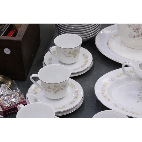 77 - A CHANTILLY PART DINNER SERVICE TO INCLUDE PLATES, BOWLS, A TEAPOT, SERVING PLATES, SUGAR BOWL, CREA... 