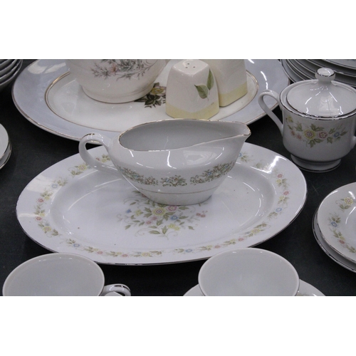 77 - A CHANTILLY PART DINNER SERVICE TO INCLUDE PLATES, BOWLS, A TEAPOT, SERVING PLATES, SUGAR BOWL, CREA... 