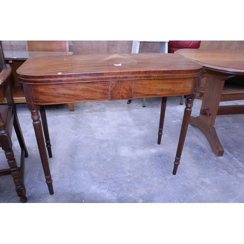 3036 - A 19TH CENTURY MAHOGANY FOLD OVER TEA TABLE ON TURNED AND FLUTED LEGS, 37