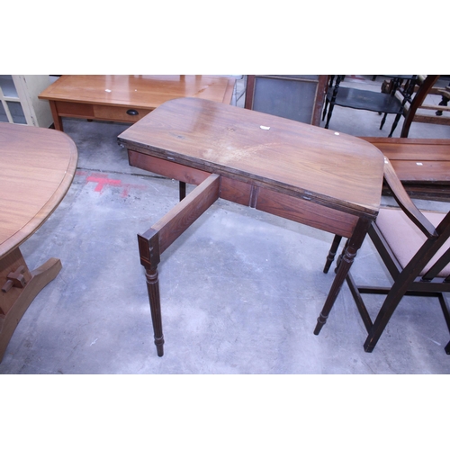 3036 - A 19TH CENTURY MAHOGANY FOLD OVER TEA TABLE ON TURNED AND FLUTED LEGS, 37