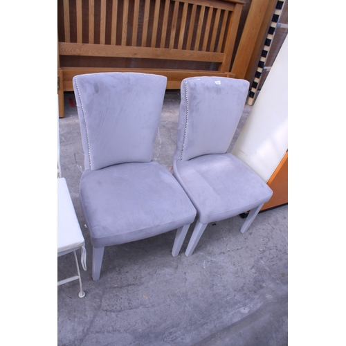 3042 - A PAIR OF MODERN UPHOLSTERED AND PARTIALLY STUDDED DINING CHAIRS