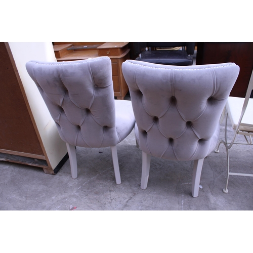 3042 - A PAIR OF MODERN UPHOLSTERED AND PARTIALLY STUDDED DINING CHAIRS