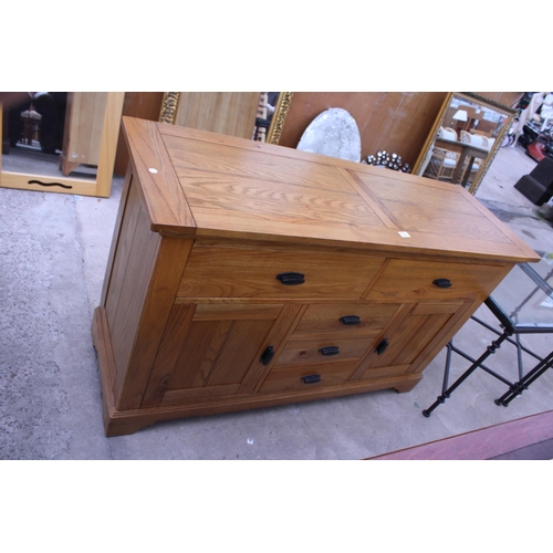 3050 - A MODERN OAK SIDEBOARD ENCLOSING FIVE DRAWERS AND TWO CUPBOARDS 56