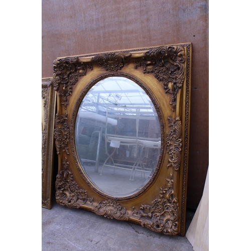 3053 - A 19TH CENTURY STYLE GILT OVAL WALL MIRROR IN A 33X29