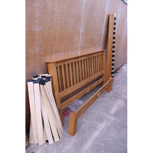 3054 - A MODERN LIGHT OAK 6FT BEDSTEAD