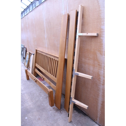 3054 - A MODERN LIGHT OAK 6FT BEDSTEAD