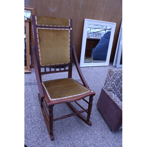 3057 - AN EDWARDIAN ROCKING CHAIR