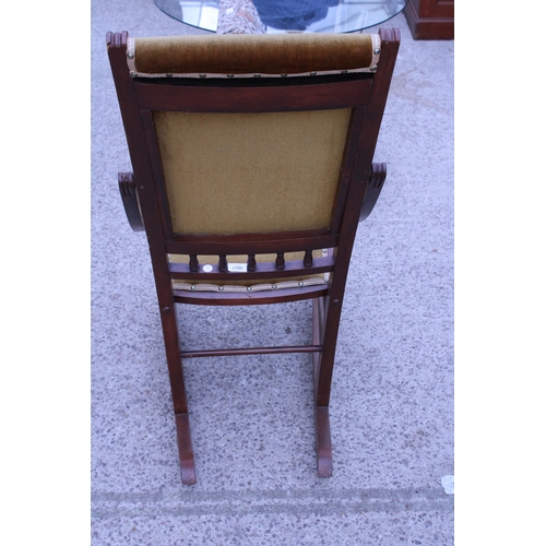 3057 - AN EDWARDIAN ROCKING CHAIR