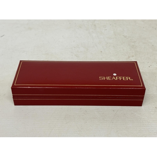 85 - A BOXED SHEAFFER PEN AS NEW WITH TWO PACKETS OF REFILLS .