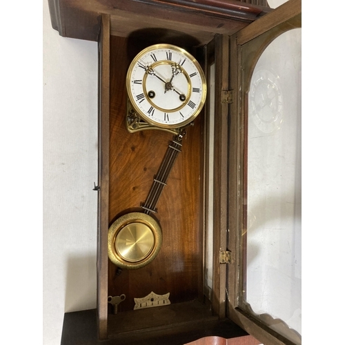 40 - A LATE 19TH CENTURY VIENNA WALL CLOCK WITH PENDULUM