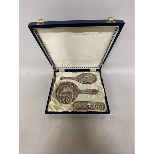 12 - A HALLMARKED BIRMINGHAM BROADWAY AND CO SILVER HAIRBRUSH, MIRROR AND BRUSH SET IN A PRESENTATION BOX