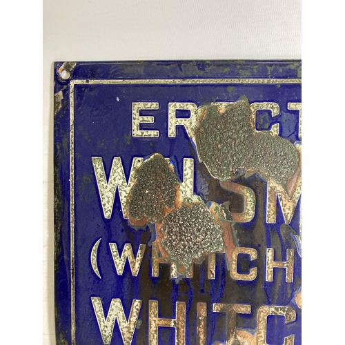 26 - AN ENAMEL SIGN W.H. SMITH WHITCHURCH - 41 X 21.5 CM