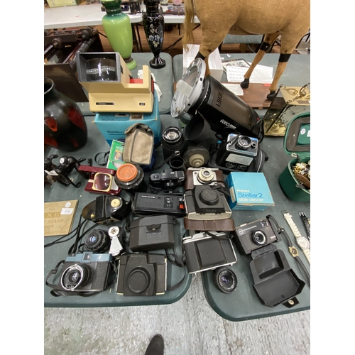 167 - A LARGE LOT OF VINTAGE CAMERAS AND LENSES