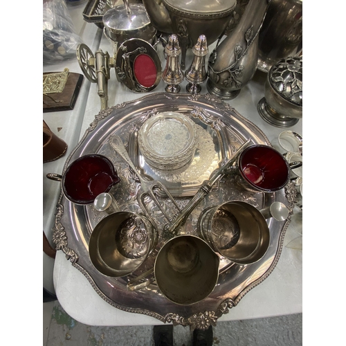 192 - A QUANTITY OF SILVER PLATED ITEMS TO INCLUDE A LARGE TRAY, NAPKIN RINGS, COFFEE POT, A PLANTER, VASE... 