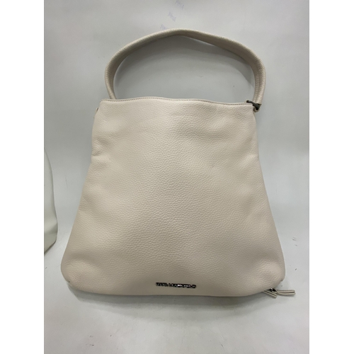 227 - AN AS NEW GENUINE BEIGE COLOURED KARL LAGERFELD BAG